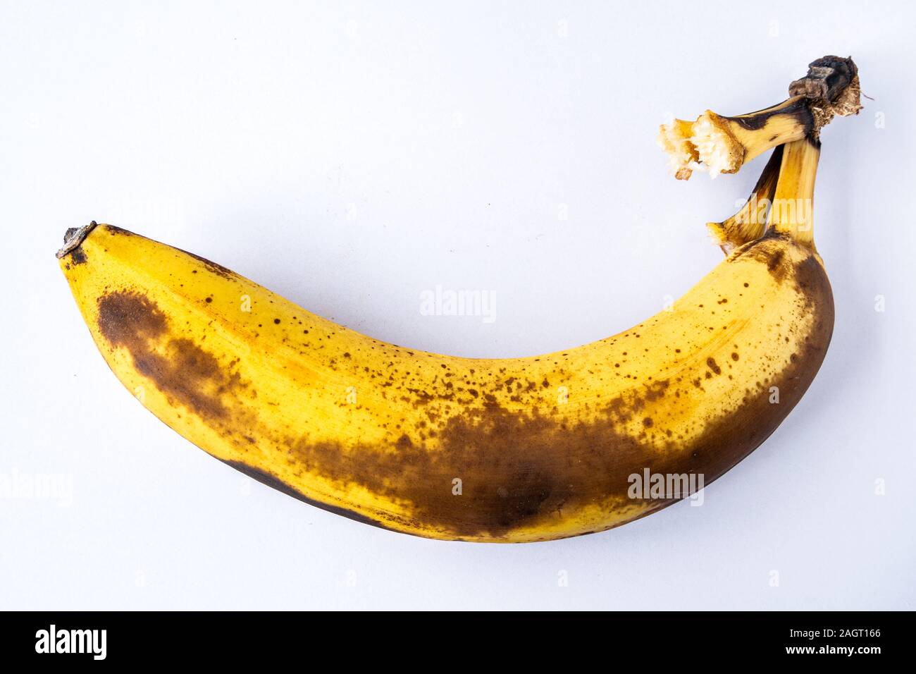 Last banana of a bunch nearly overripe Stock Photo - Alamy