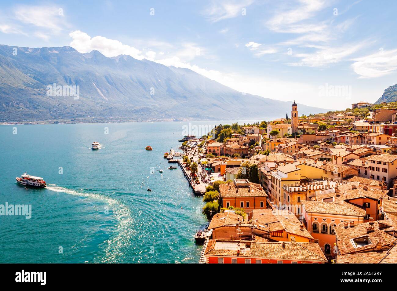 Limone Sul Garda cityscape on the shore of Garda lake surrounded by ...