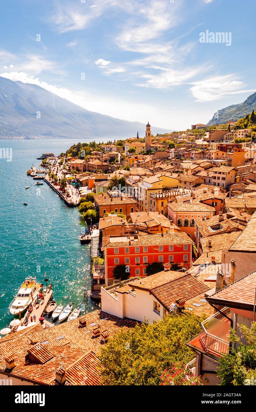 Limone Sul Garda cityscape on the shore of Garda lake surrounded by scenic Northern Italian nature. Amazing Italian cities Stock Photo