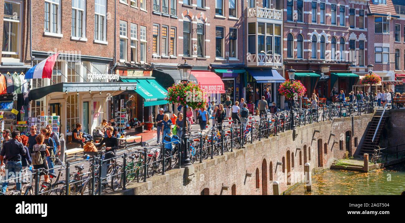 Panoramic view of the Utrecht city centre with tourists at the Oudegracht (Old Canal) and Vismarkt (Fish Market) on a sunny afternoon. The Netherlands Stock Photo