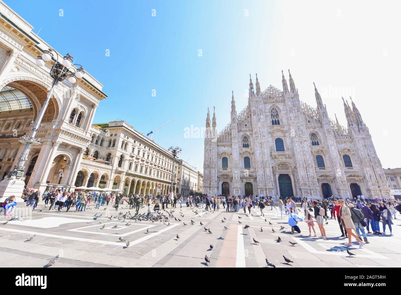 Tourists in Front of Milan Cathedral or Duomo di Milano Stock Photo