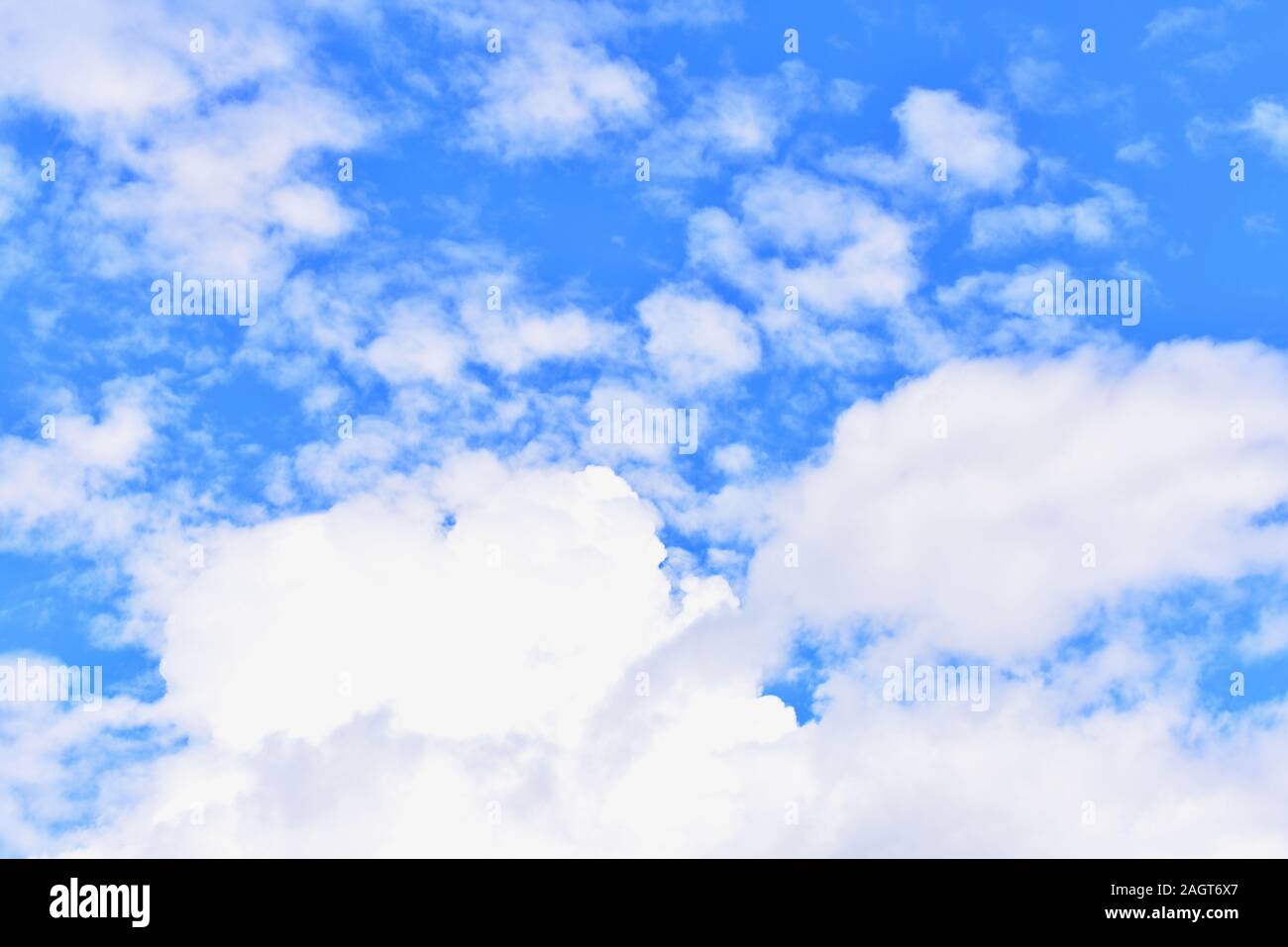 Blue Sky Background with White Fluffy Clouds Stock Photo - Alamy