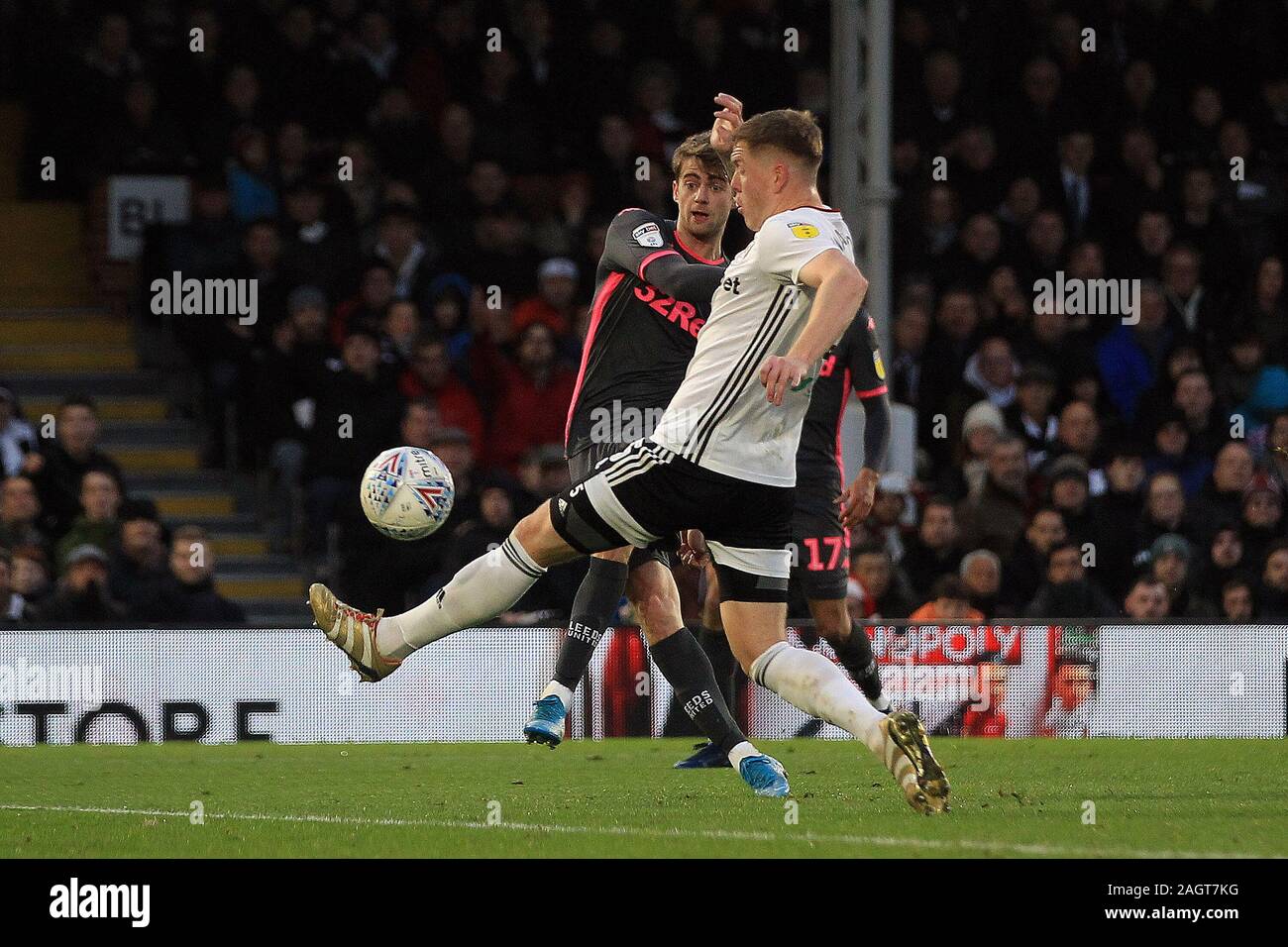 London, UK. 21st Dec, 2019. Patrick Bamford of Leeds United (L) takes a shot at goal. EFL Skybet championship match, Fulham v Leeds Utd at Craven Cottage in London on Saturday 21st December 2019. this image may only be used for Editorial purposes. Editorial use only, license required for commercial use. No use in betting, games or a single club/league/player publications. pic by Steffan Bowen/Andrew Orchard sports photography/Alamy Live news Credit: Andrew Orchard sports photography/Alamy Live News Stock Photo