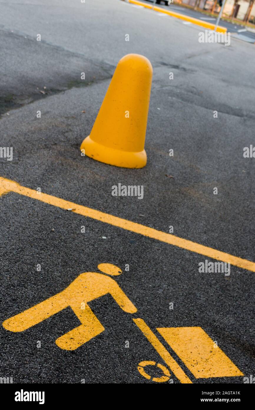 yellow goods unloading signs on the asphalt Stock Photo