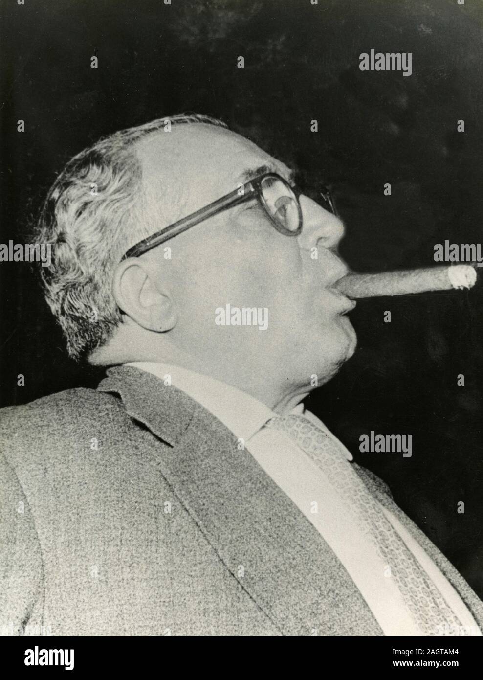 Italian Christian Democrat politician Silvio Milazzo smoking cigar, 1950s Stock Photo