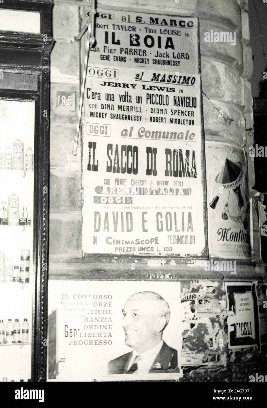 Cinema posters on the wall, Italy 1950s Stock Photo