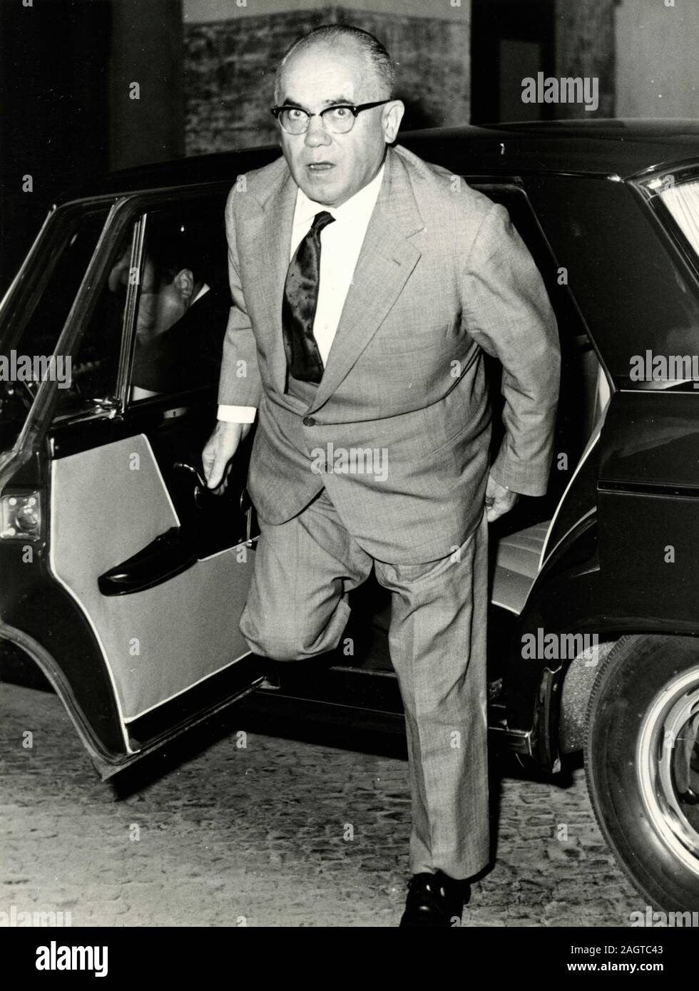Italian politician Minister Giulio Pastore getting off the car, Rome, Italy 1959 Stock Photo