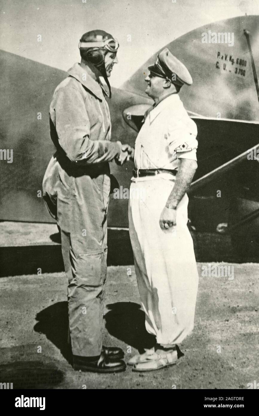 Italian Army officer, aviator, and Fascist politician Ettore Muti with Benito Mussolini, Italy 1930s Stock Photo