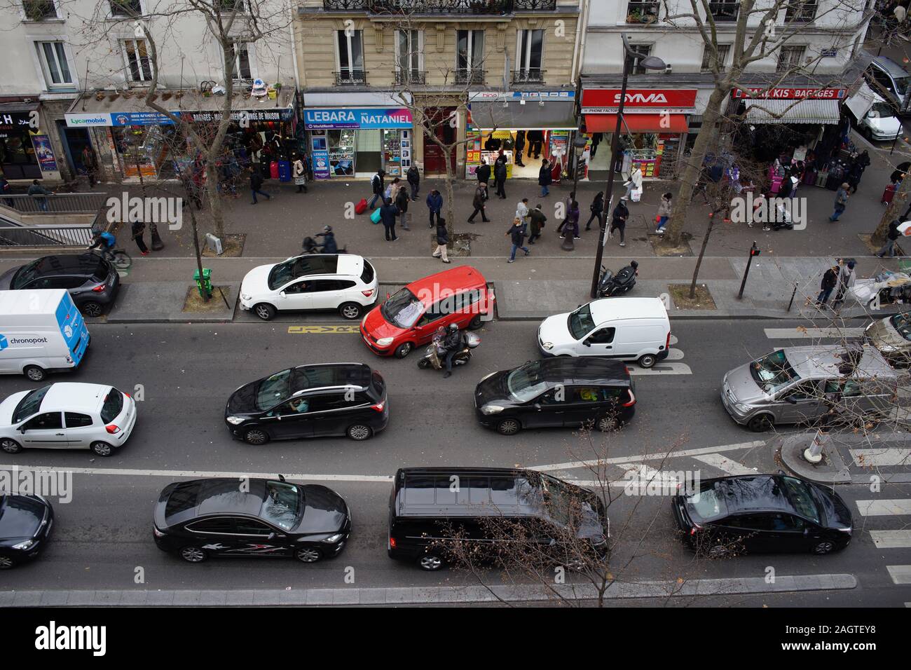 Busy traffic and pedestrians as Paris transport strike causes travel disruption, Boulevard Barbès, Paris, France Stock Photo