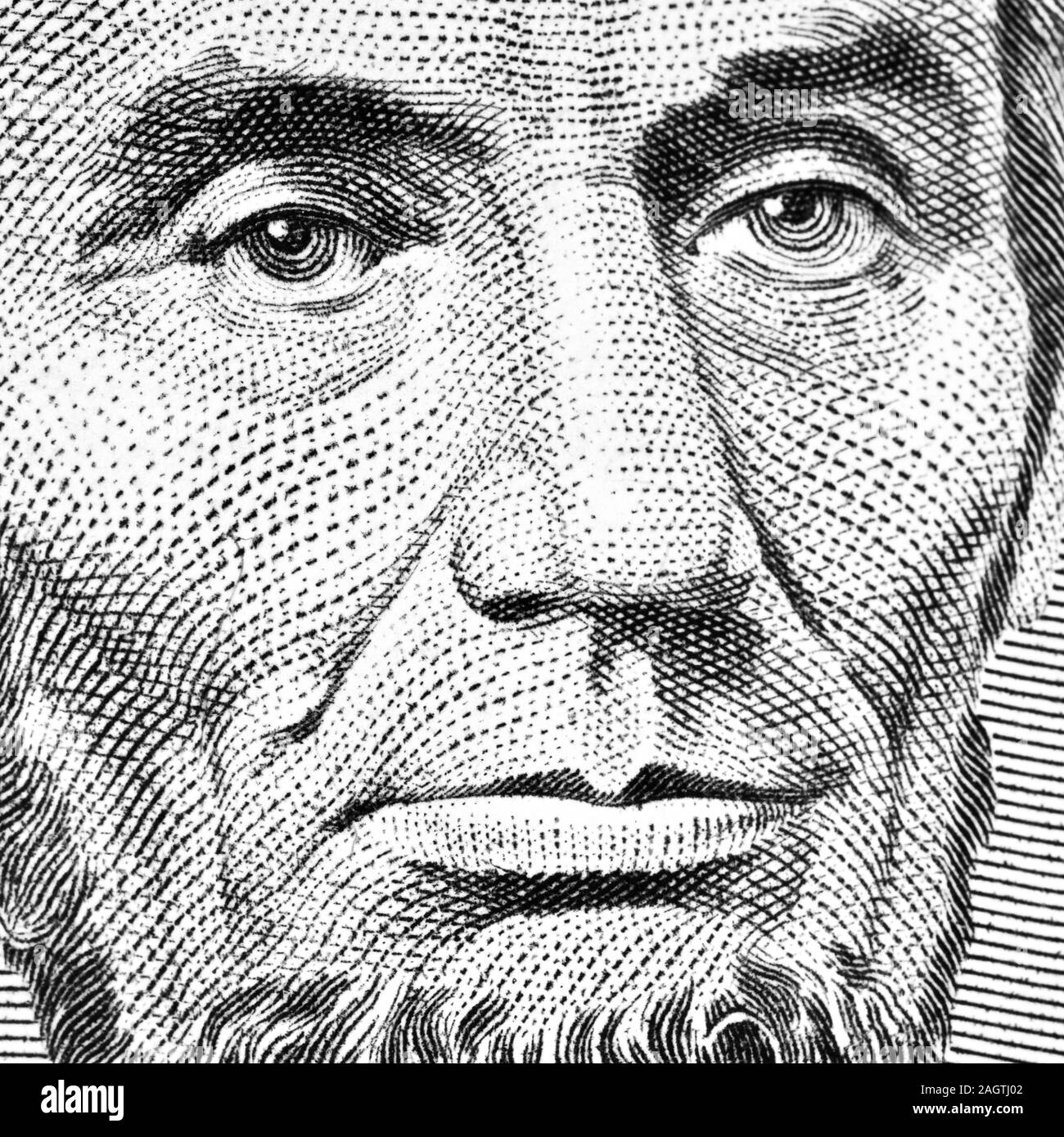 Closeup of Abraham Lincoln on the 5 Dollar Bill Stock Photo