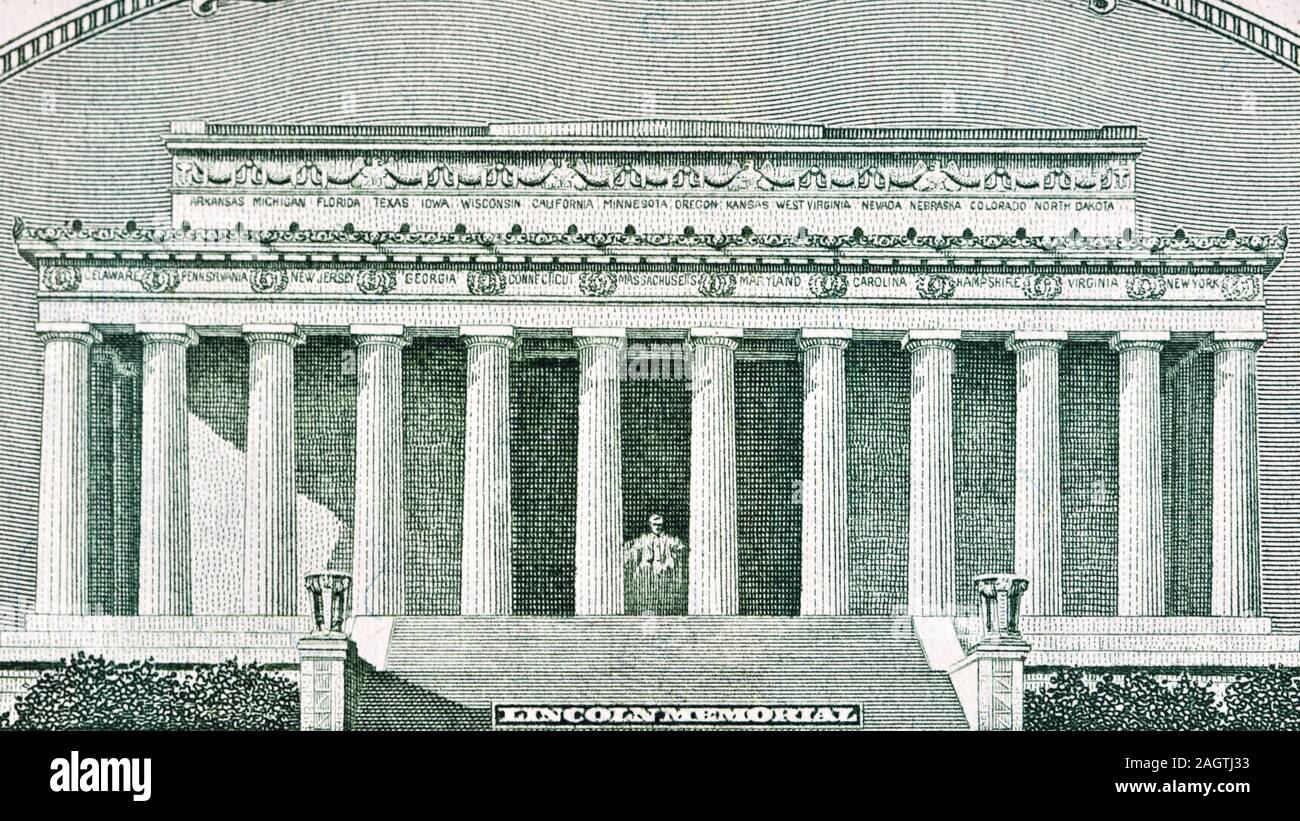 United States five-dollar bill features Lincoln Memorial on the back Stock Photo