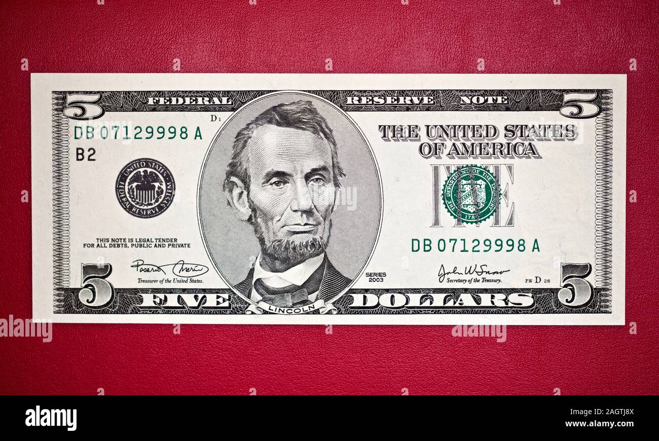 United States five dollar bill features the 16th U.S. President
