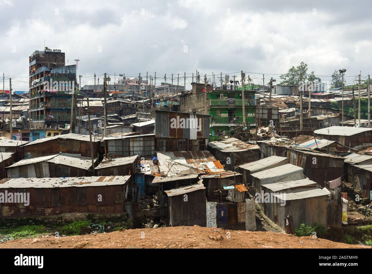 View of Mathare slum with corrugated metal shacks and buildings, Nairobi, Kenya Stock Photo