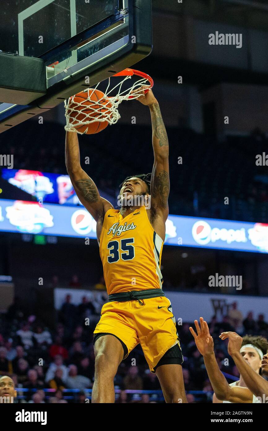 Winston-Salem, NC, USA. December 21, 2019: North Carolina A&T Aggies forward Tyrone Lyons (35) goes for the dunk during the second half of the NCAA Basketball matchup at LJVM Coliseum in Winston-Salem, NC. (Scott Kinser/Cal Sport Media) Stock Photo