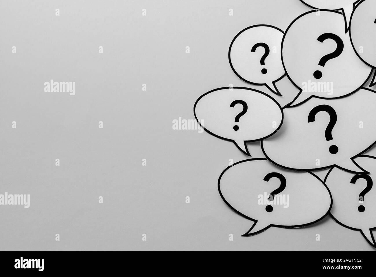 Question marks on speech bubbles side border Stock Photo Alamy