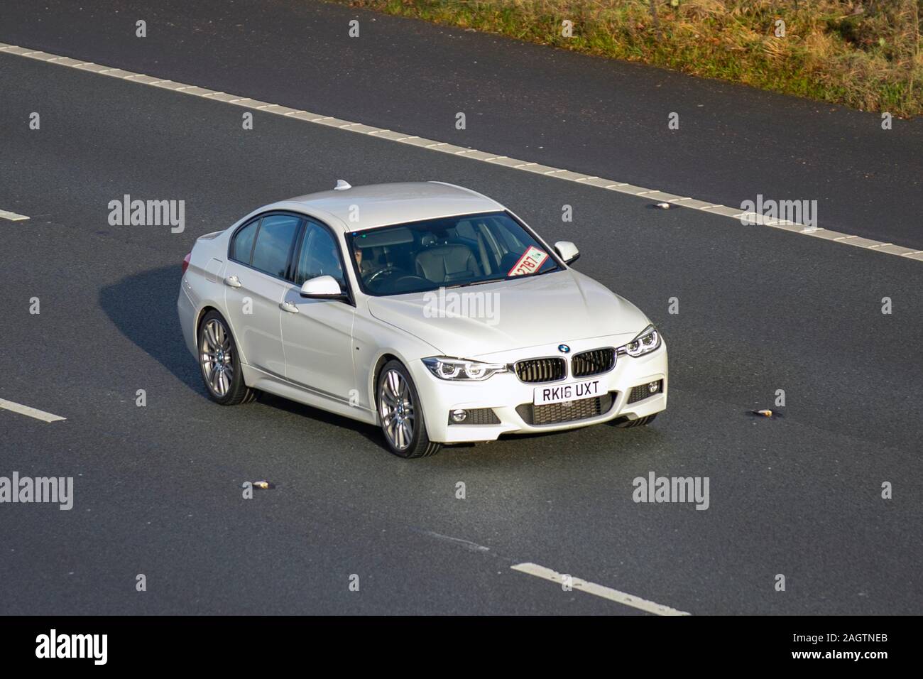 16 White Bmw 3i M Sport Uk Vehicular Traffic Transport Modern Vehicles Saloon Cars Vehicles Vehicle Uk Roads Motors Motoring South Bound On The 3 Lane M61 Motorway Highway Stock Photo Alamy