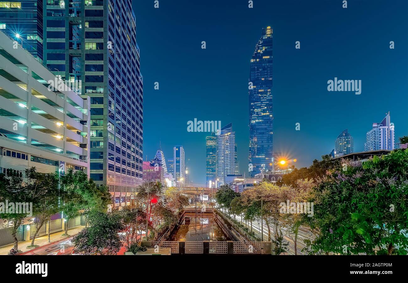 Asia, Thailand, Bangkok, Night cityscape in Bangkok, Silom District. Pixel tower Stock Photo