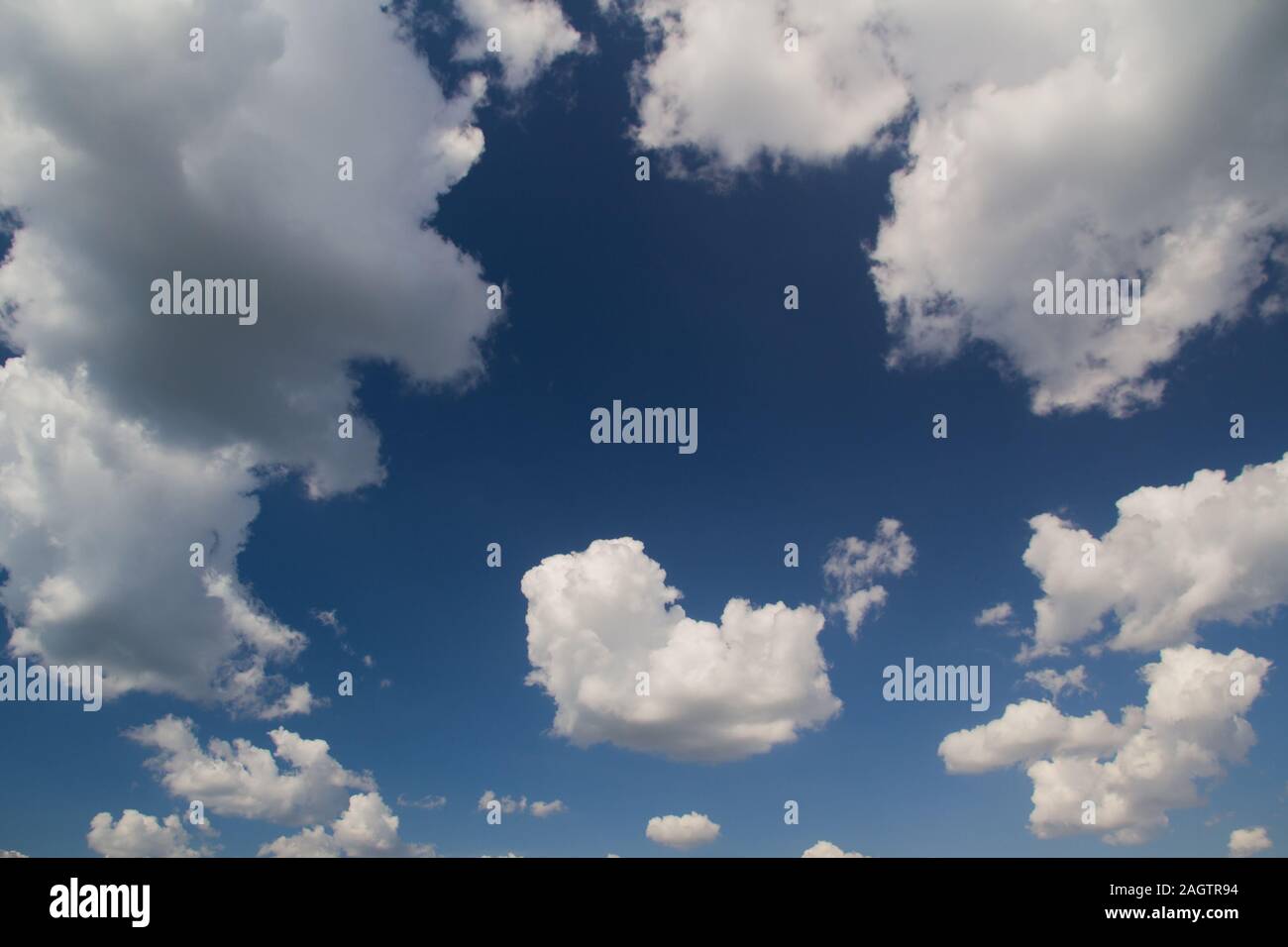 Blue sky with white clouds. Natural background image Stock Photo - Alamy