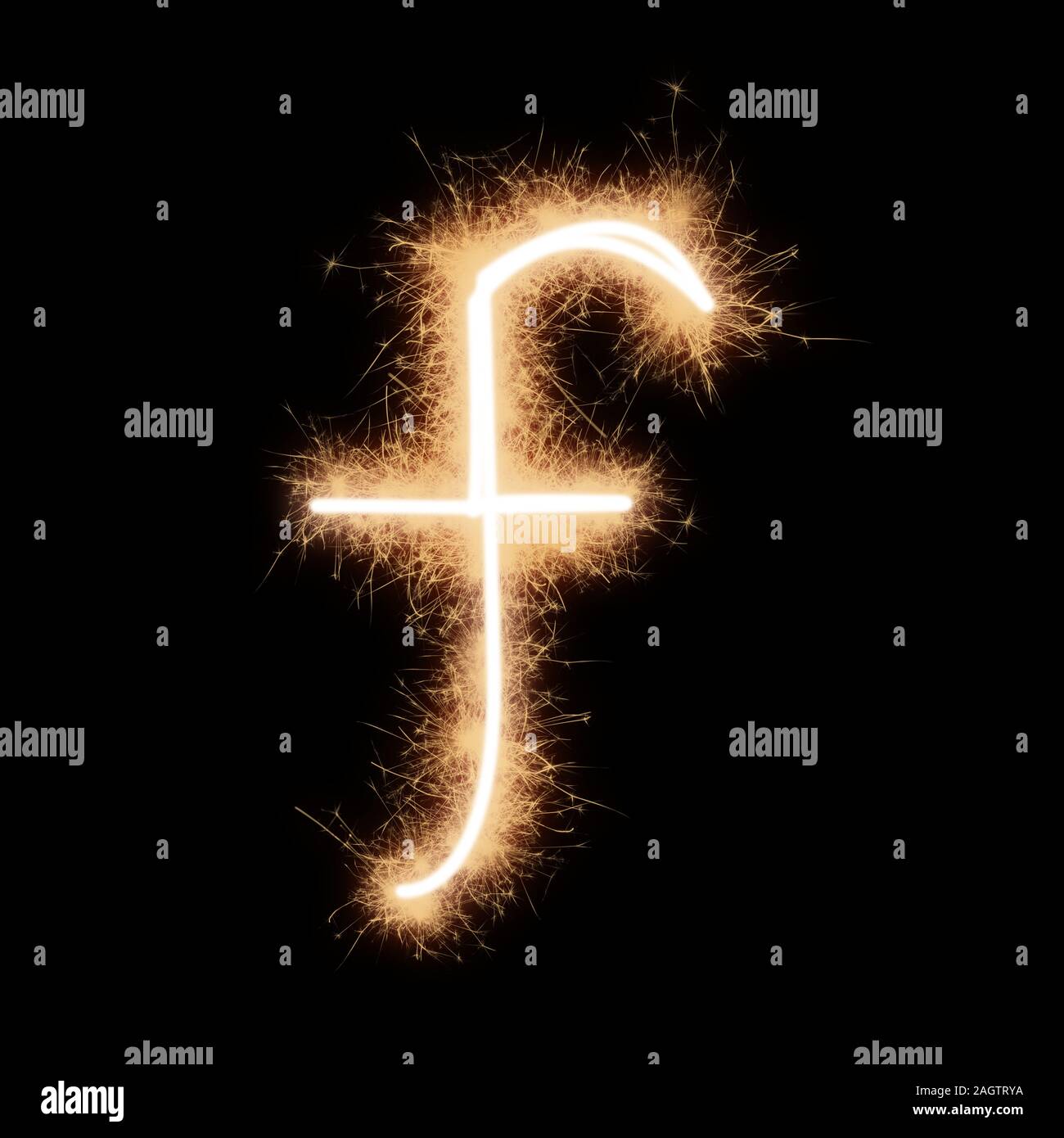 Lower case f letter of alphabet written by squib sparks on a black background. Stock Photo