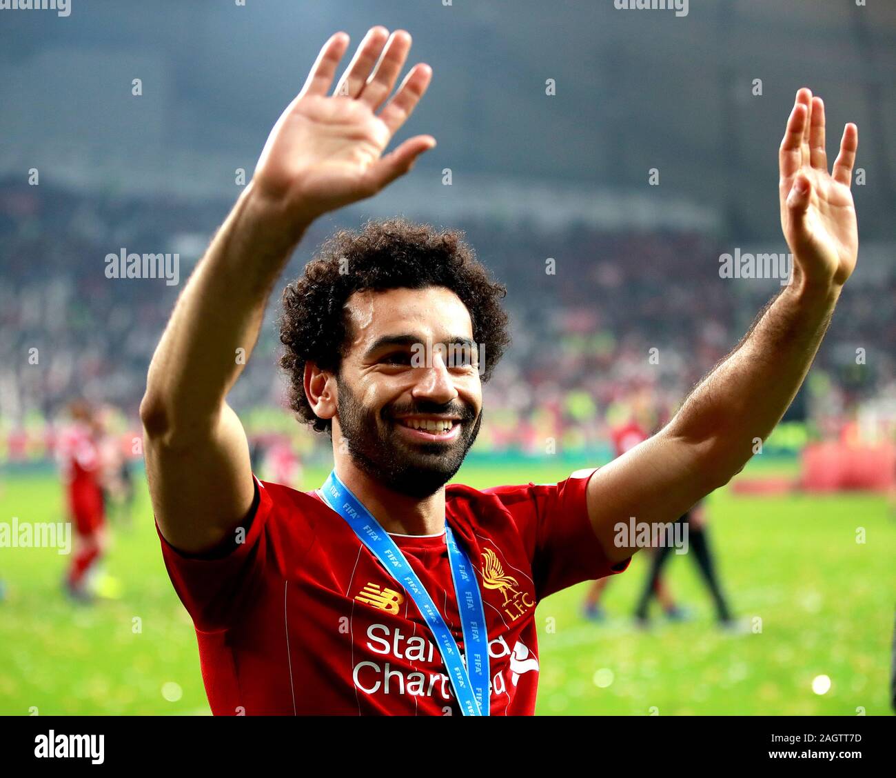 Liverpool's Mohamed Salah celebrates after the FIFA Club World Cup final at the Khalifa International Stadium, Doha. Stock Photo