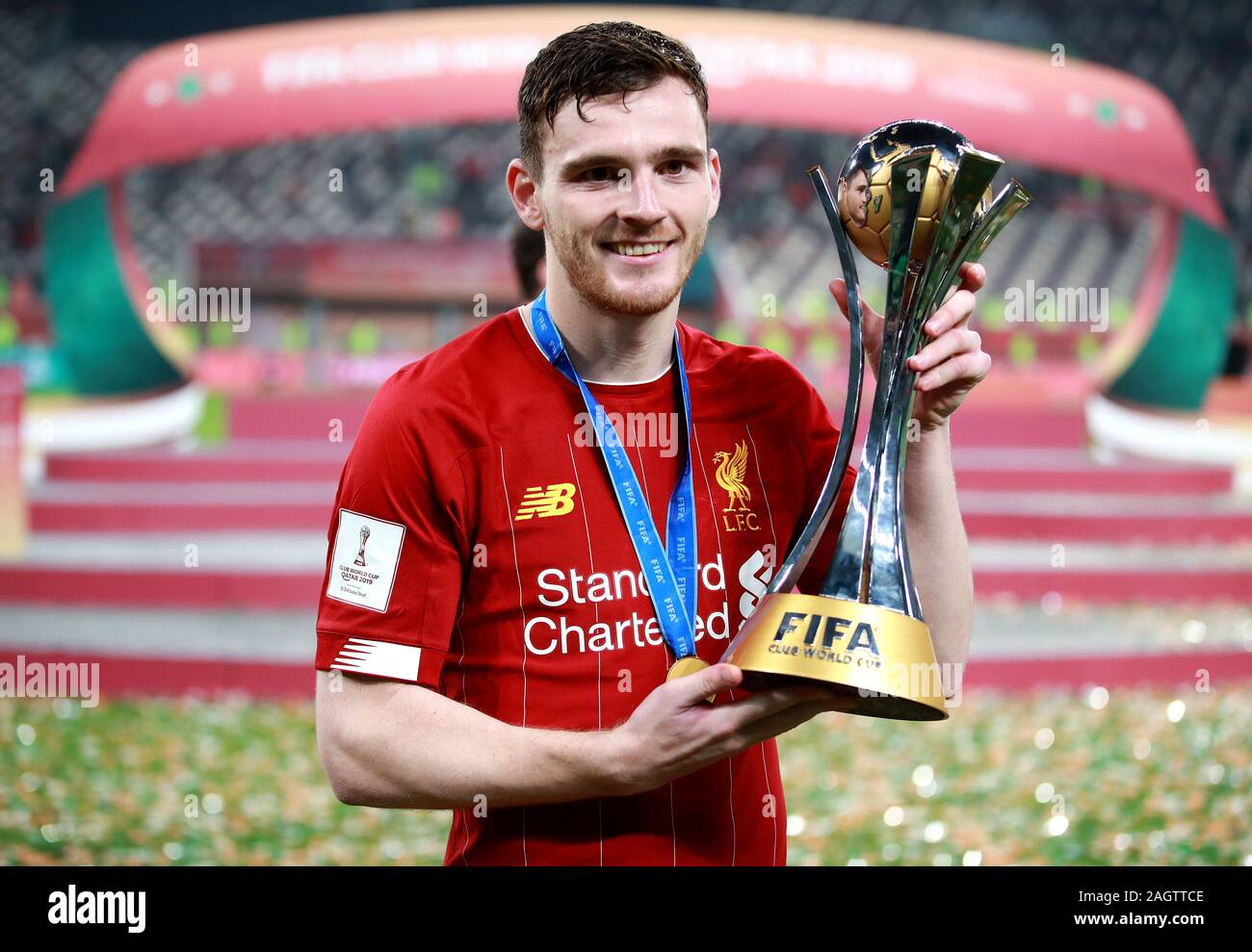 Liverpool's Andrew Robertson celebrates with the trophy during the FIFA Club World Cup final at the Khalifa International Stadium, Doha. Stock Photo