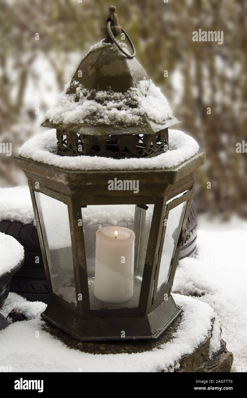 Candle light with snow hi-res stock photography and images - Alamy