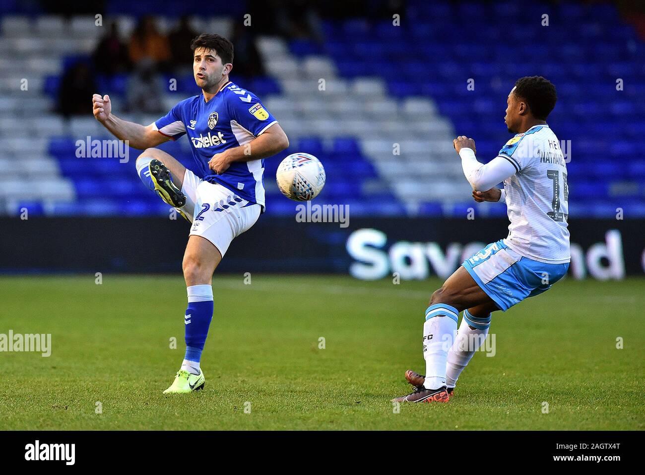 Oldham, UK. 21st Dec, 2019. OLDHAM, ENGLAND - DECEMBER 21ST Zak Mills of Oldham Athletic and Ashley Nathaniel-George of Crawley Town during the Sky Bet League 2 match between Oldham Athletic and Crawley Town at Boundary Park, Oldham on Saturday 21st December 2019. (Credit: Eddie Garvey | MI News) Photograph may only be used for newspaper and/or magazine editorial purposes, license required for commercial use Credit: MI News & Sport /Alamy Live News Stock Photo