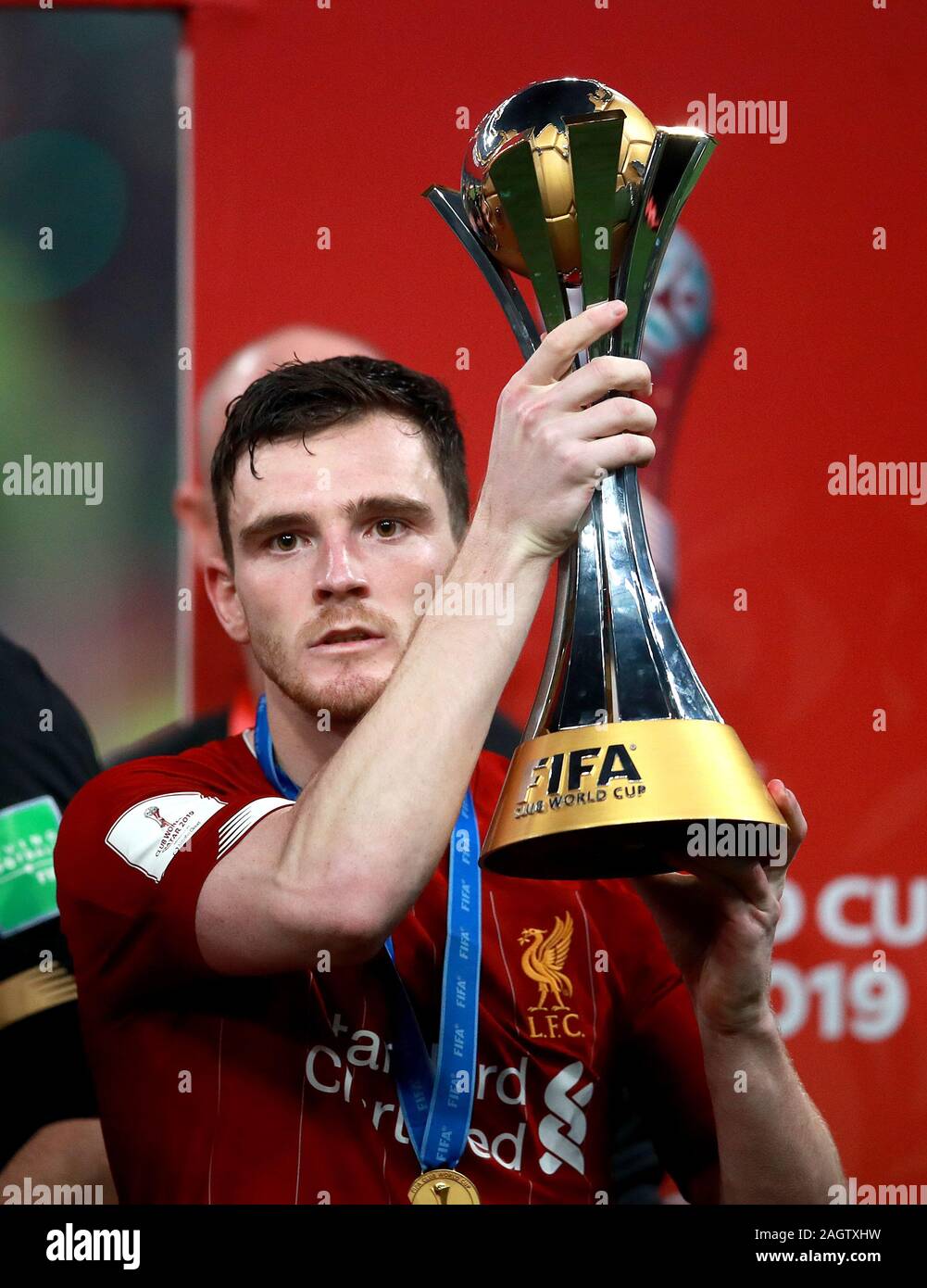 Liverpool's Andrew Robertson celebrates with the trophy after the FIFA Club World Cup final at the Khalifa International Stadium, Doha. Stock Photo