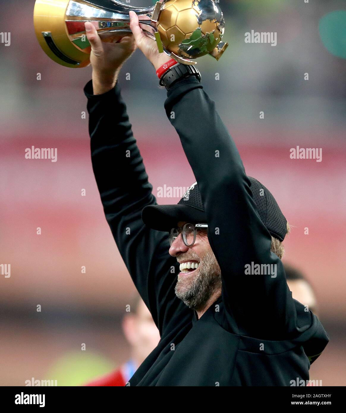 Liverpool manager Jurgen Klopp celebrates with the trophy after the FIFA Club World Cup final at the Khalifa International Stadium, Doha. Stock Photo