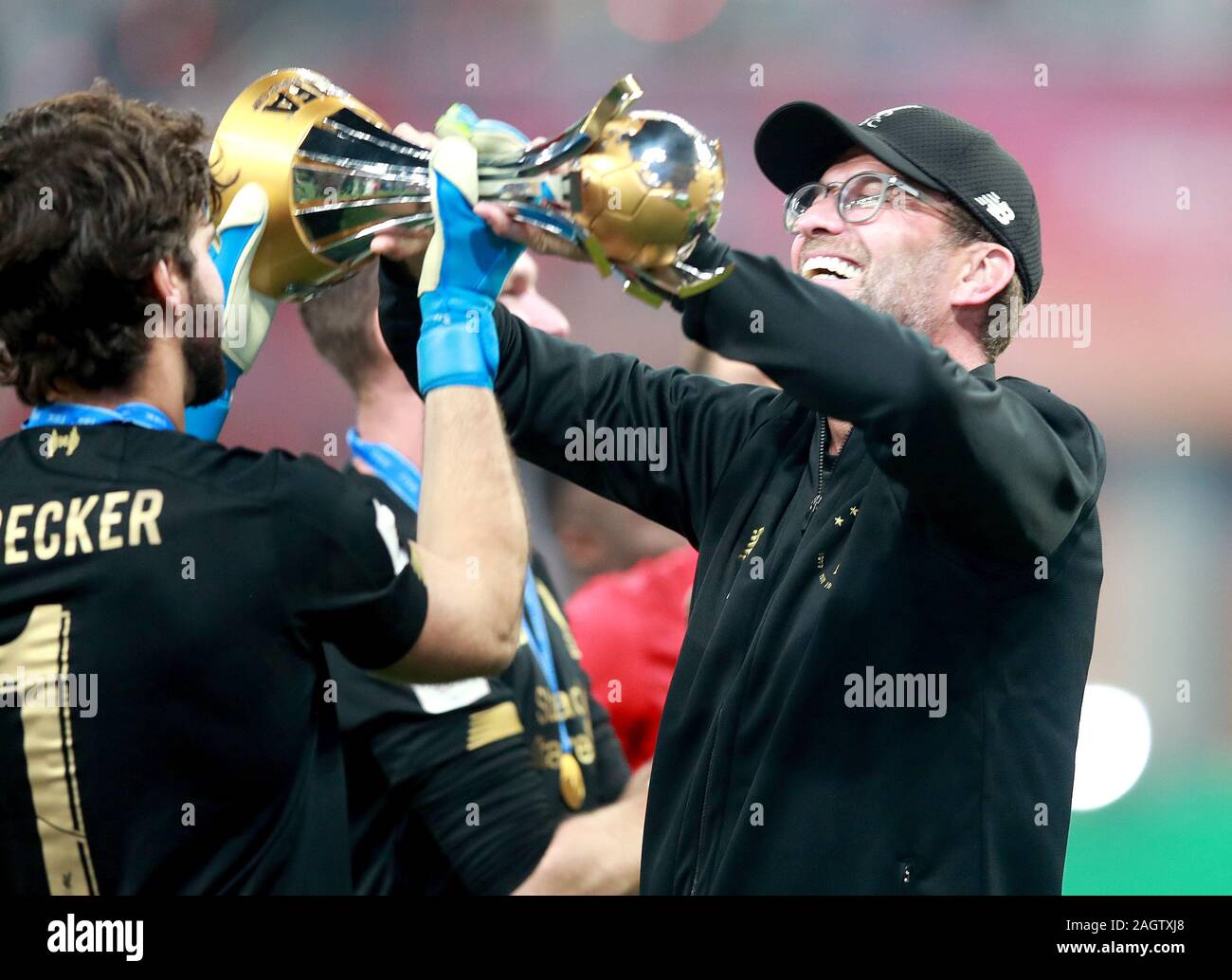 Liverpool manager Jurgen Klopp celebrates with the trophy after the FIFA Club World Cup final at the Khalifa International Stadium, Doha. Stock Photo