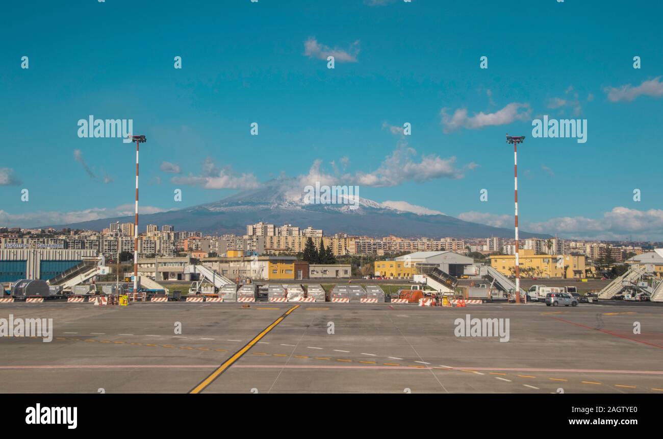 Catania Airport, in Sicily, seen with Mount Etna in the far distance