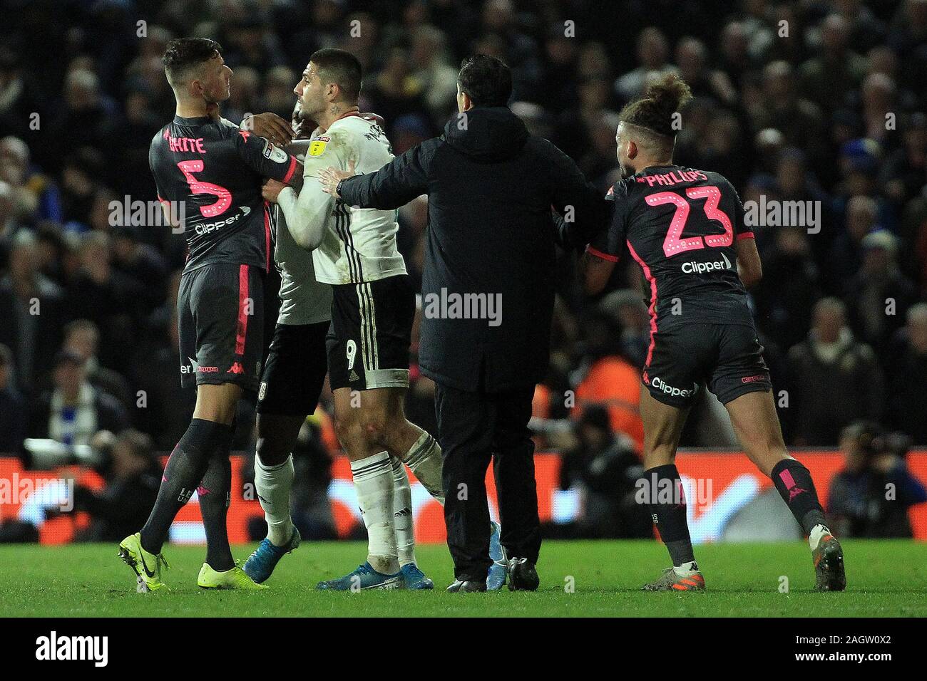London Uk 21st Dec 2019 Aleksandr Mitrovic Of Fulham 2l Grapples With Ben White Of Leeds