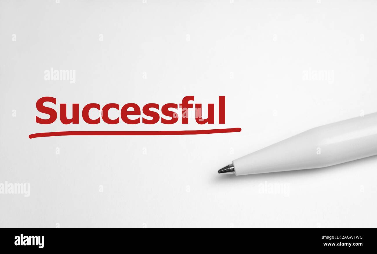 Business word successful and pen on white background. Stock Photo