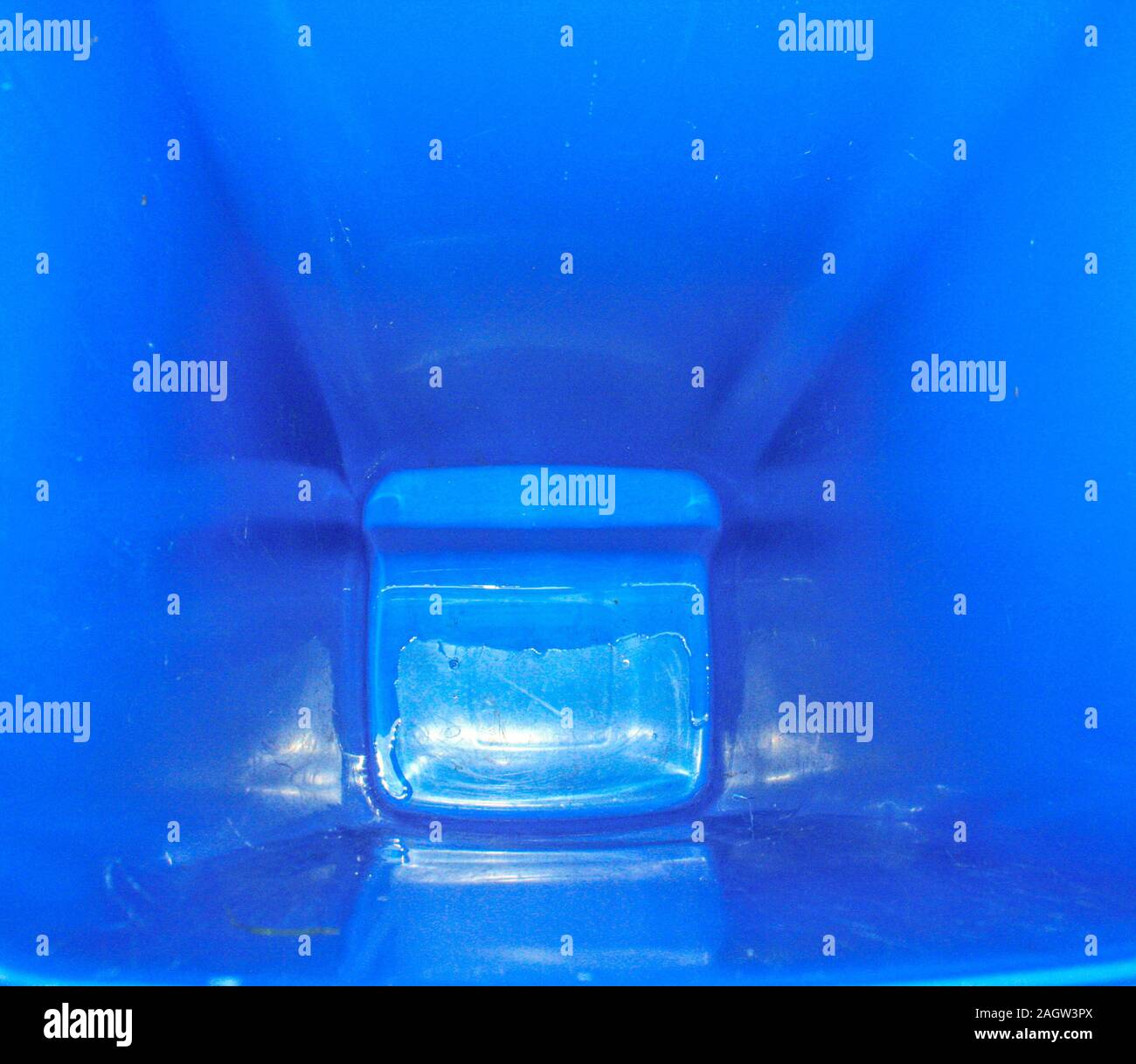 Looking down inside a clean / empty wheelie bin Stock Photo Alamy