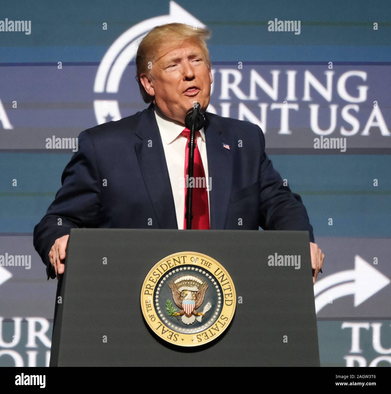 West Palm Beach, USA. 21st Dec, 2019. USA President Donald J.Trump speaks at the Turning Point USA conference for young conservatives at the Palm Beach Convention Center in West Palm Beach, Florida on Saturday, December 21, 2019. On Wednesday, December 18, 2019, President Donald Trump was the third U.S. President to be impeached by the House of Representatives. Photo by Gary I Rothstein/UPI Credit: UPI/Alamy Live News Stock Photo