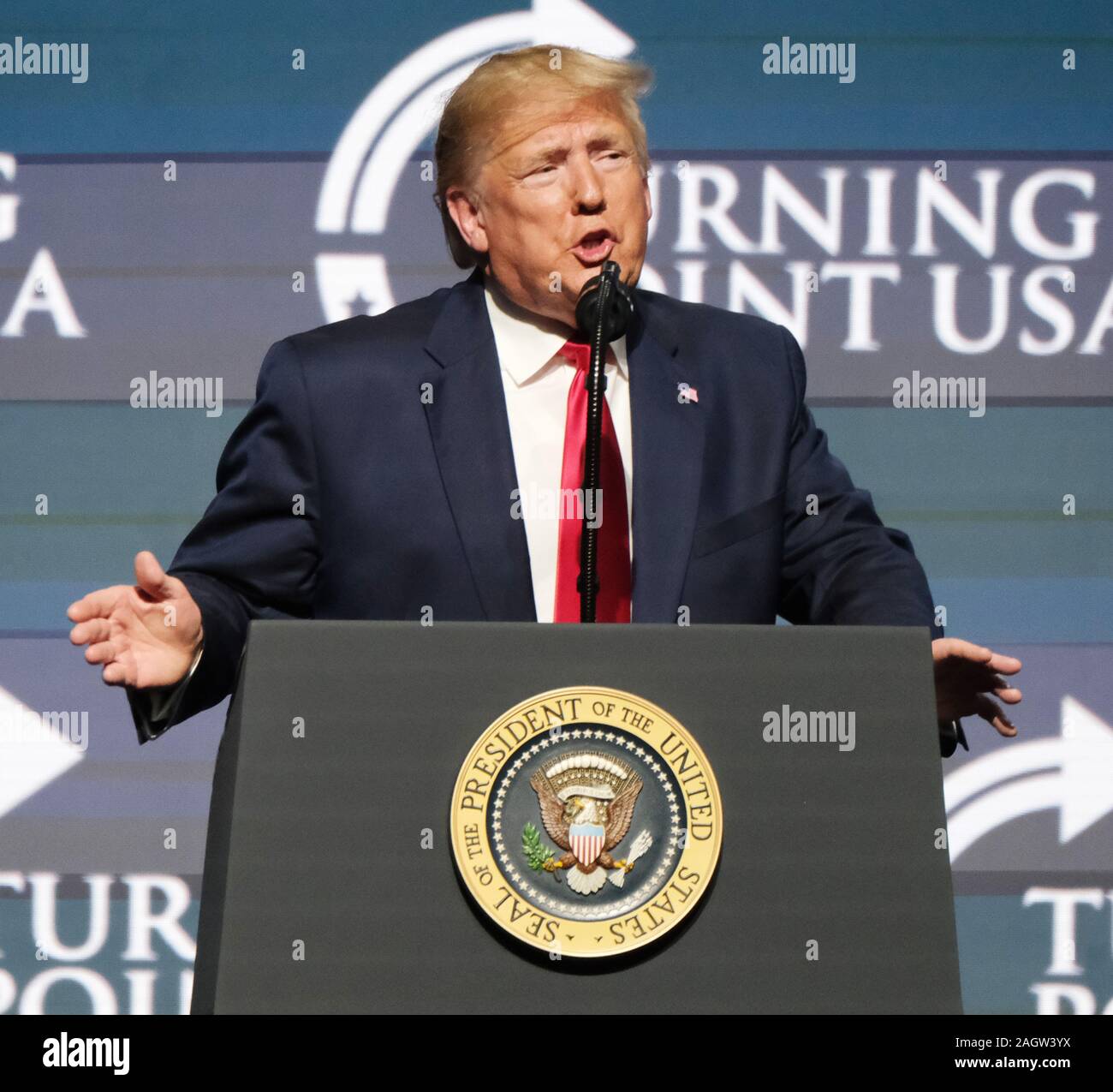 West Palm Beach, USA. 21st Dec, 2019. USA President Donald J.Trump speaks at the Turning Point USA conference for young conservatives at the Palm Beach Convention Center in West Palm Beach, Florida on Saturday, December 21, 2019. On Wednesday, December 18, 2019, President Donald Trump was the third U.S. President to be impeached by the House of Representatives. Photo by Gary I Rothstein/UPI Credit: UPI/Alamy Live News Stock Photo