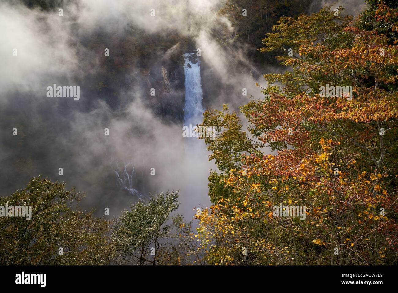 scenic of perfect view of kegon waterfall with fog and autumn season in nikko japan Stock Photo