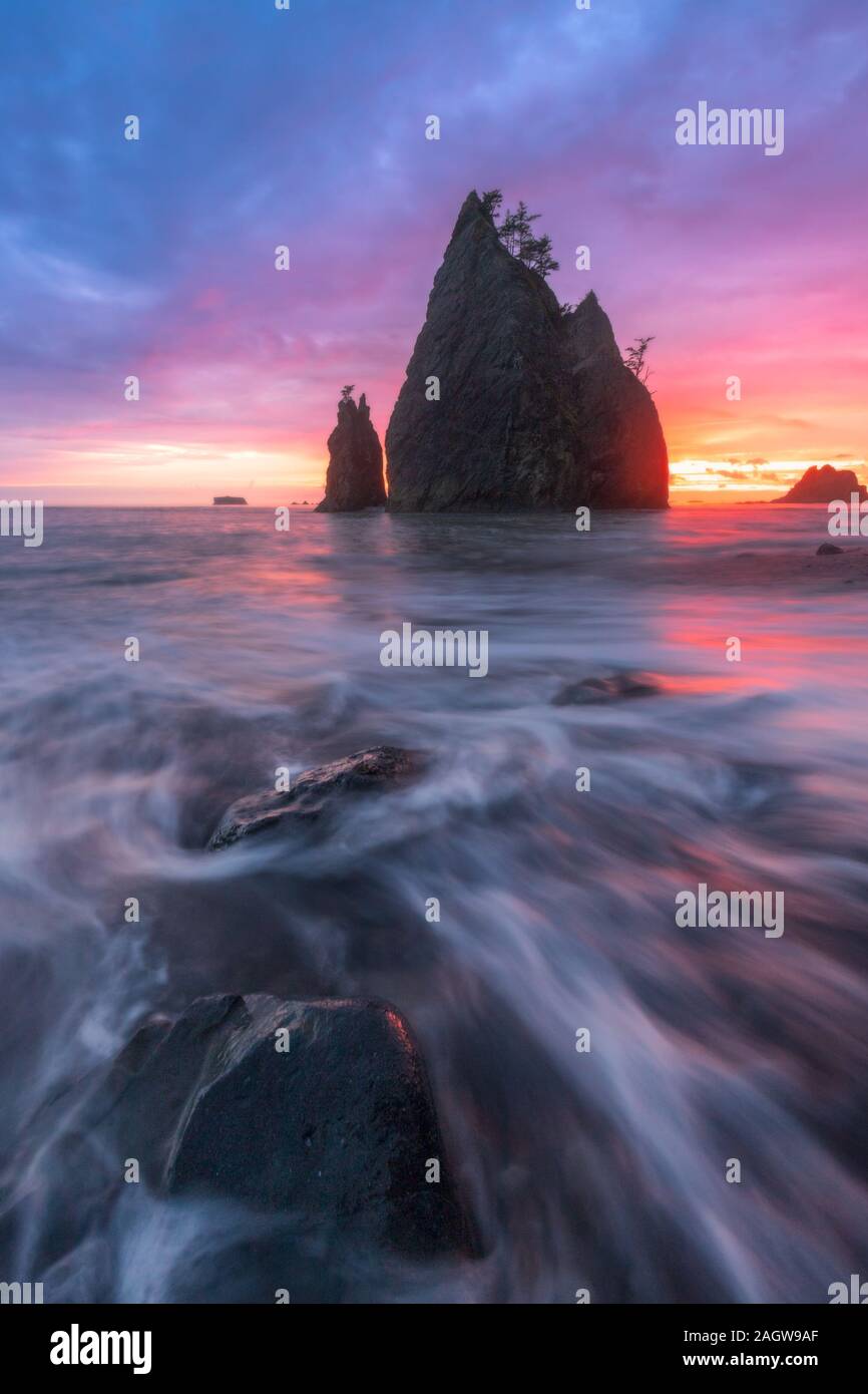Sunset view of Split Rock on Rialto Beach in Olympic National Park with
