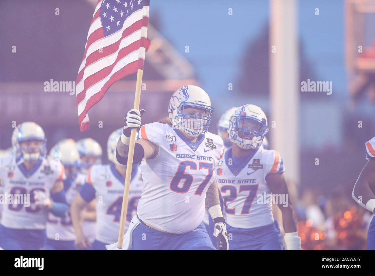 Las Vegas, NV, USA. 21st Dec, 2019. Boise State Broncos offensive lineman Garrett Larson (67) runs on to the field prior to the start of the 28th edition of the Mitsubishi Motors Las Vegas Bowl game featuring the Boise State Broncos and the Washington Huskies at Sam Boyd Stadium in Las Vegas, NV. Christopher Trim/CSM/Alamy Live News Stock Photo