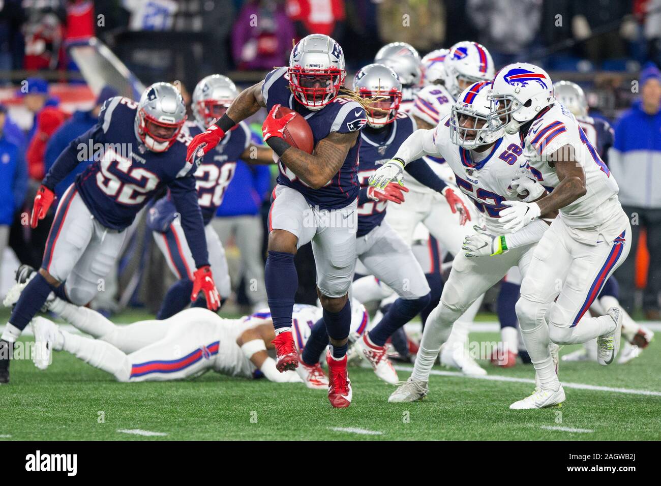 New England Patriots quarterback Tom Brady (12) points his finger to the  sky after the Patriots scored on a one-yard carry by running back Brandon  Bolden (not pictured) in the third quarter