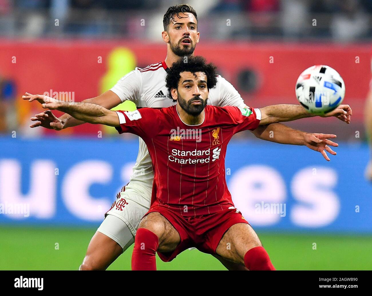 Doha, Qatar. 21st Dec, 2019. Mohamed Salah (front) of Liverpool vies for  the ball with Pablo Mari of Flamengo during the final of the FIFA Club  World Cup Qatar 2019 in Doha,