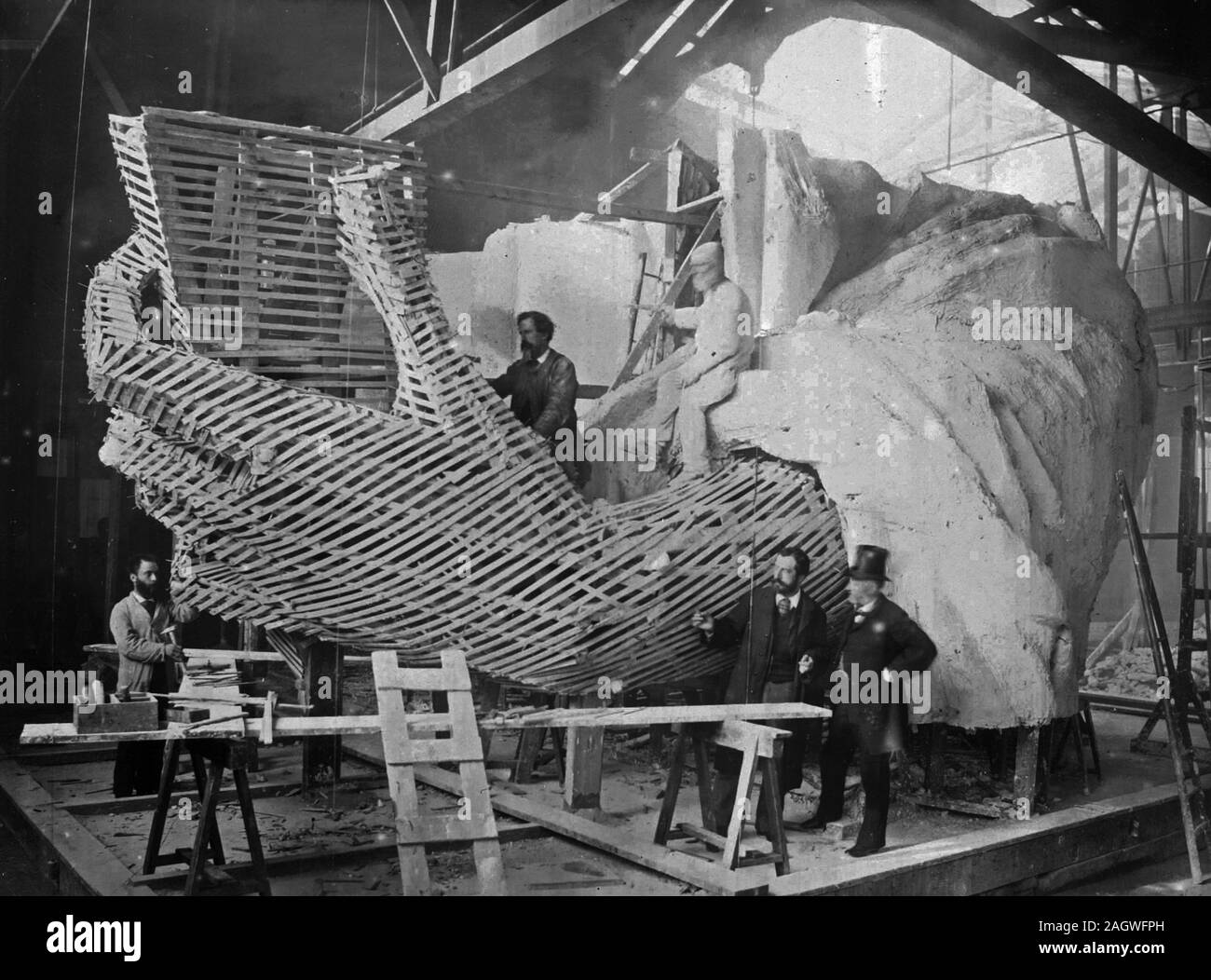 Construction of the skeleton and plaster surface of the left arm and hand of the Statue of Liberty Stock Photo