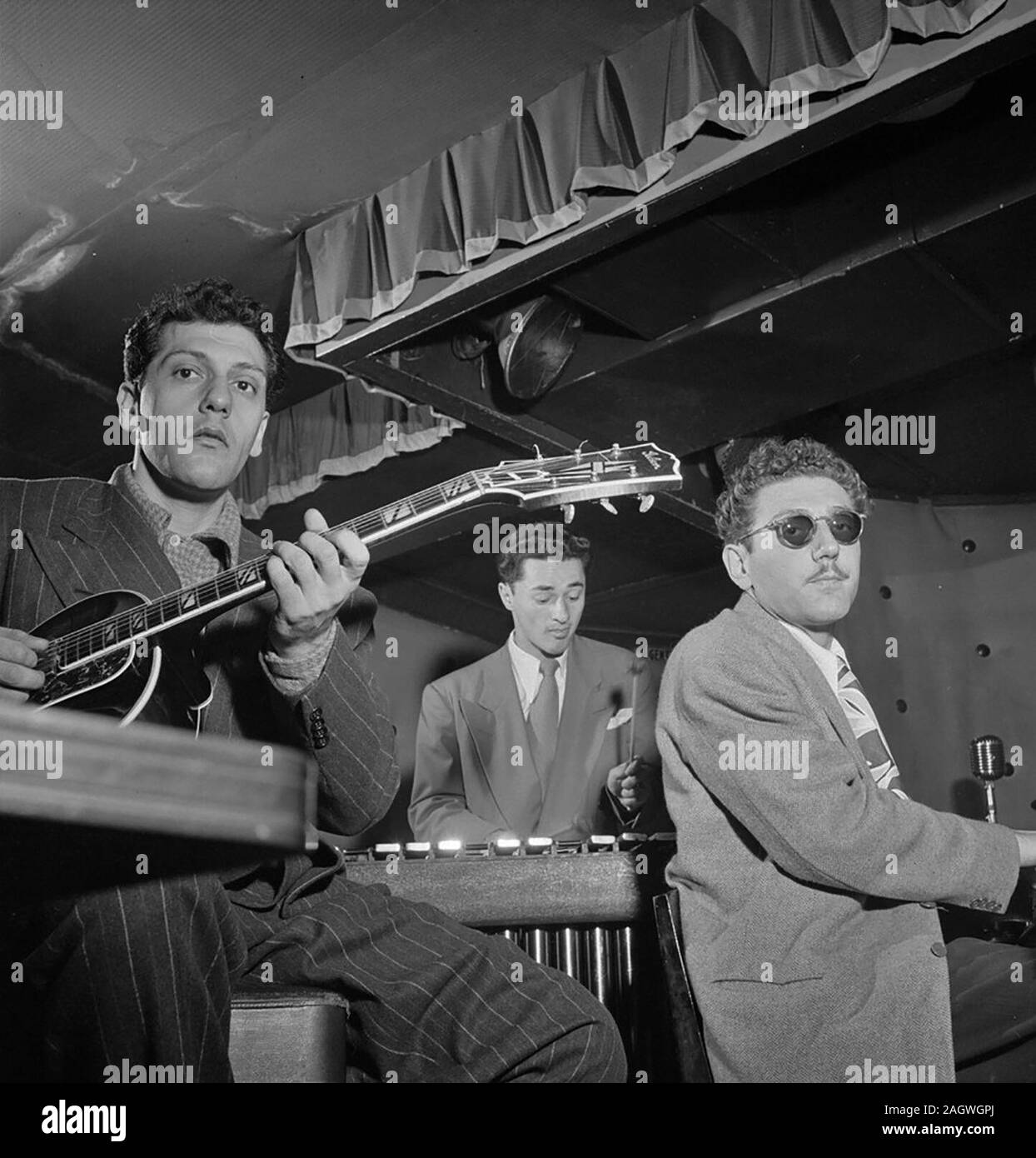 Portrait of Bill (Buddy) De Arango, Terry Gibbs, and Harry Biss, Three Deuces, New York, N.Y., ca. June 1947 Stock Photo