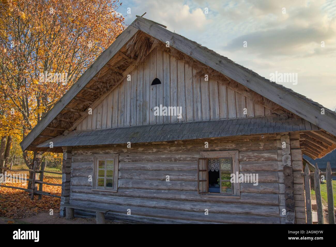 Russian old village in autumn. Wooden houses Stock Photo - Alamy
