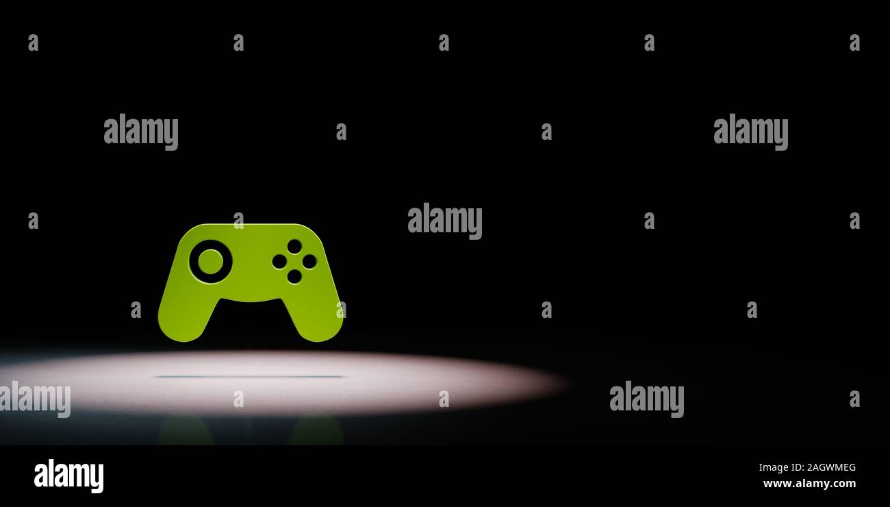Green Gamepad Controller 3D Symbol Shape Spotlighted on Black Background with Copy Space 3D Illustration Stock Photo