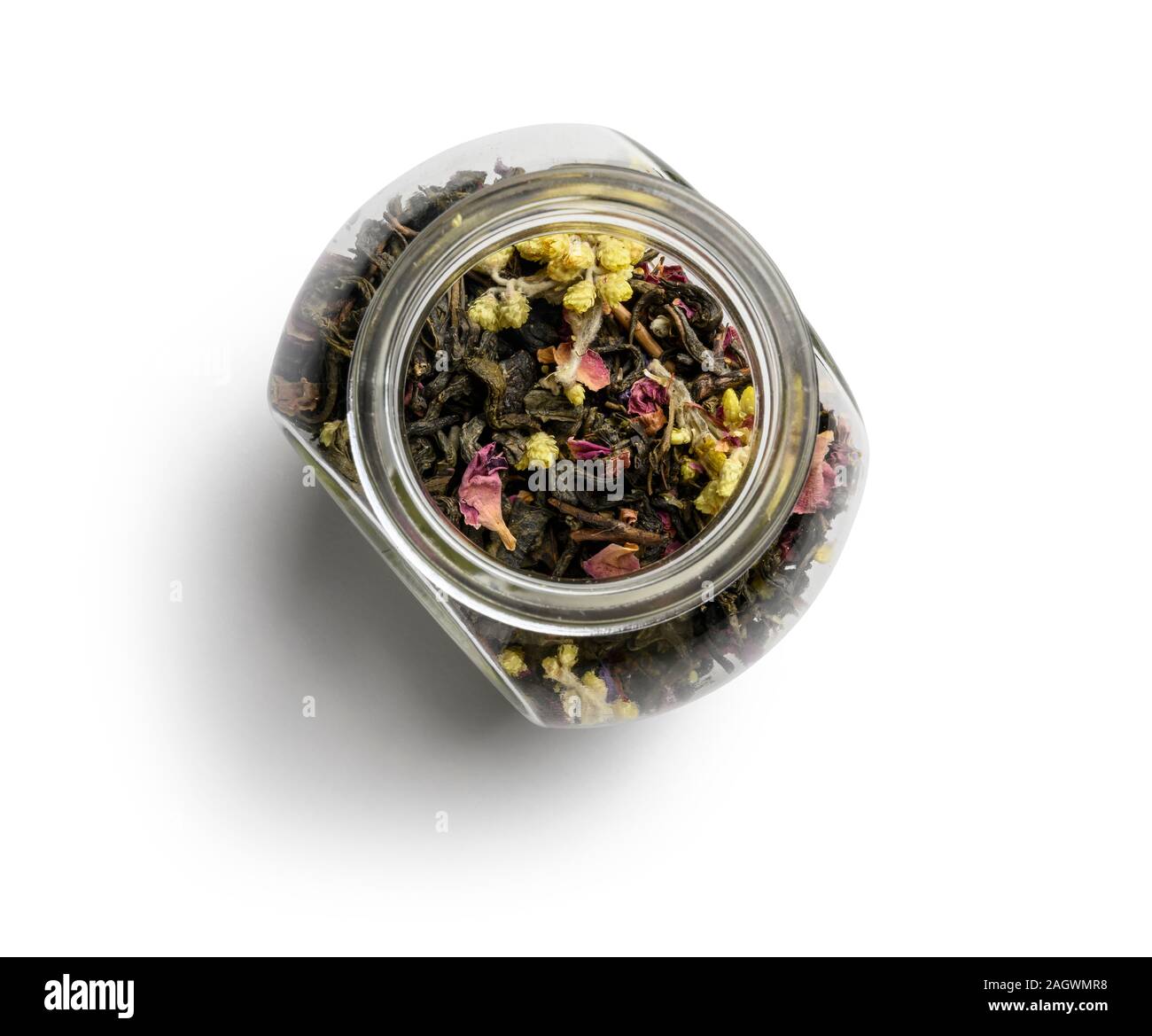 Green tea with aromatic additives. Top view on white background Stock ...