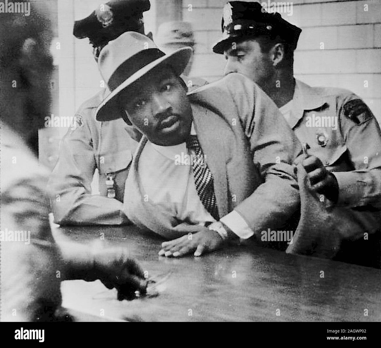 Martin Luther King Jr. arrested in Montgomery, Alabama. Martin Luther King Jr. (January 15, 1929 – April 4, 1968) was an American Christian minister and activist who became the most visible spokesperson and leader in the Civil Rights Movement from 1955 until his assassination in 1968. Born in Atlanta, Georgia, King is best known for advancing civil rights through nonviolence and civil disobedience, inspired by his Christian beliefs and the nonviolent activism of Mahatma Gandhi. Stock Photo