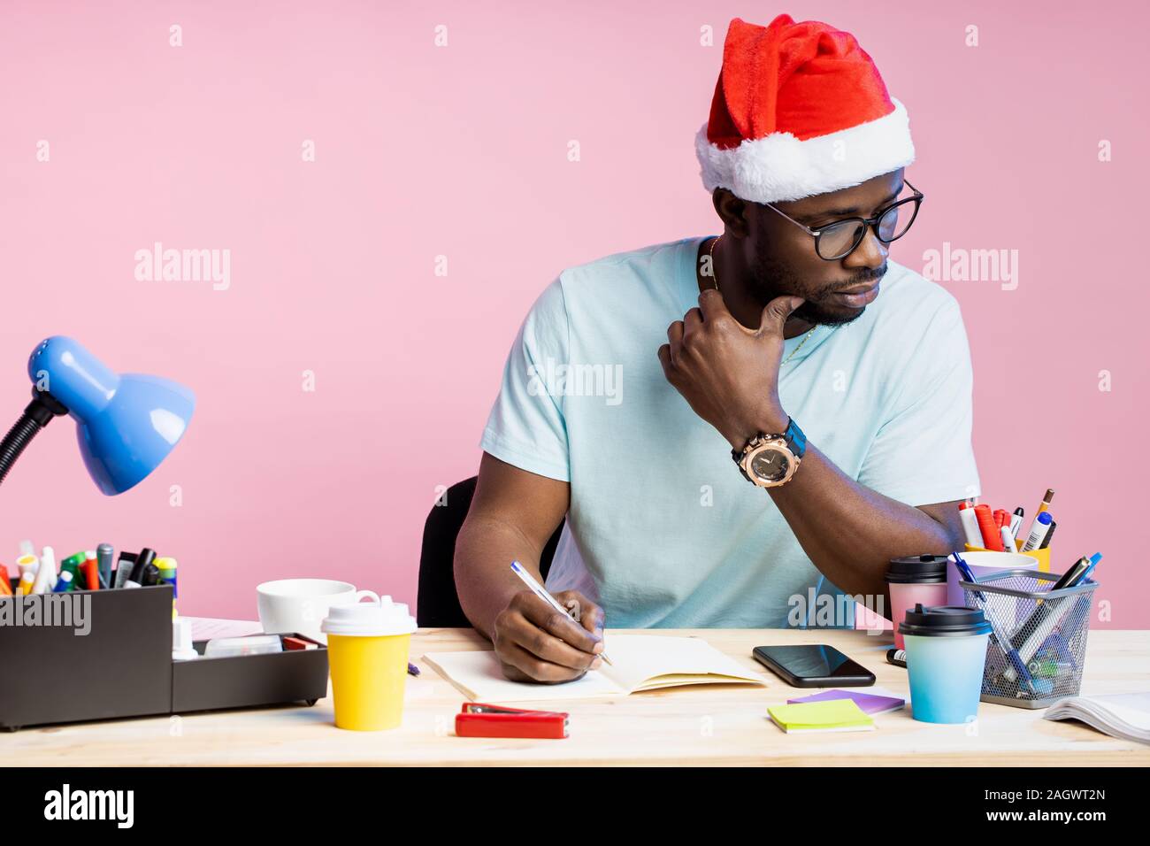 Serious guy dressed in santa hi-res stock photography and images - Alamy