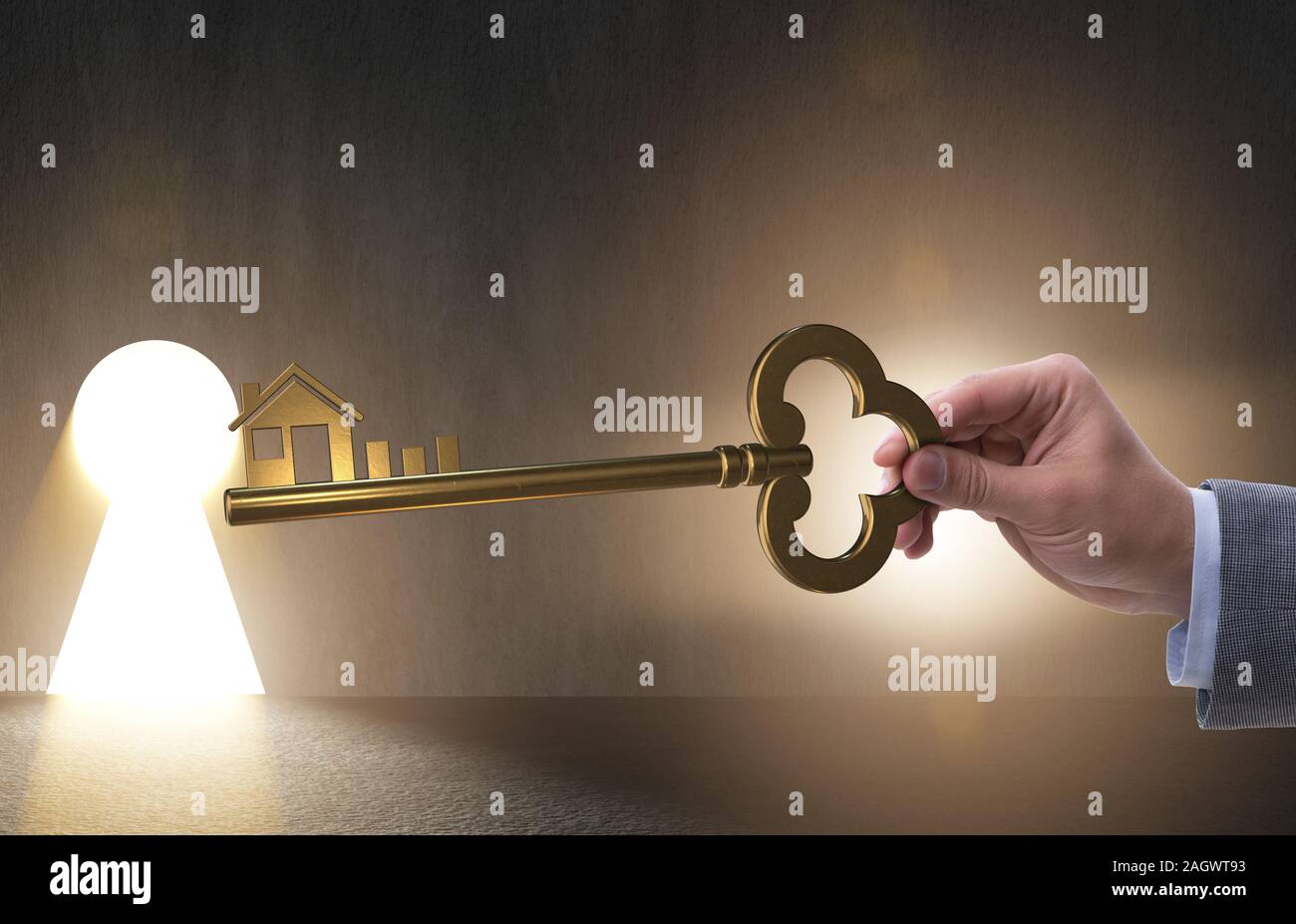 The businessman holding key in real estate concept Stock Photo - Alamy