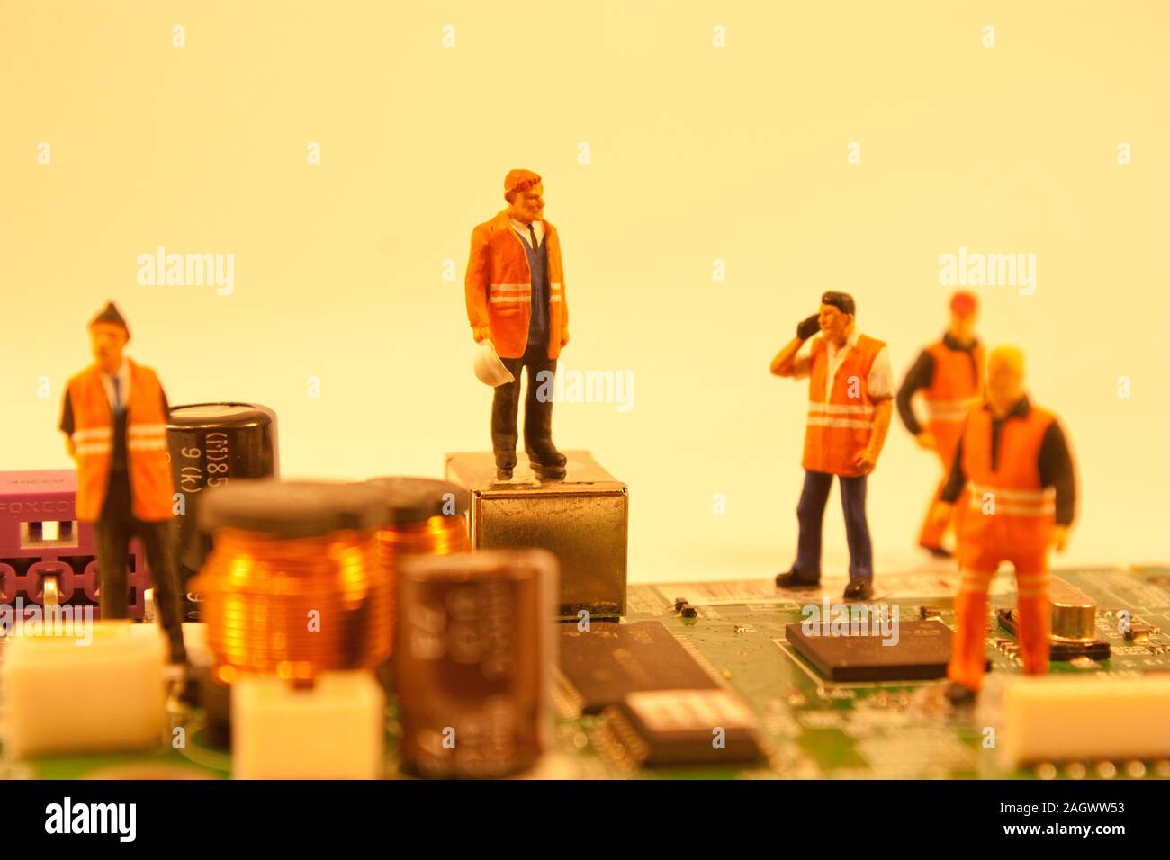 Engineering team examining components hi-res stock photography and ...